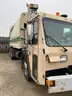 2001 Crane Carrier Co. Rear Loading Garbage Truck