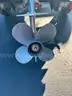 Mercury Inflatable Boat w/9.9hp Honda and EZ Loader Trailer