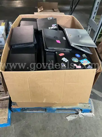 BIN OF LAPTOPS