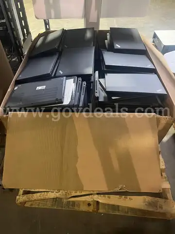 BIN OF LAPTOPS