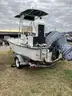 TRITON ENFORCER C/C BOAT WITH MOTOR AND TRAILER