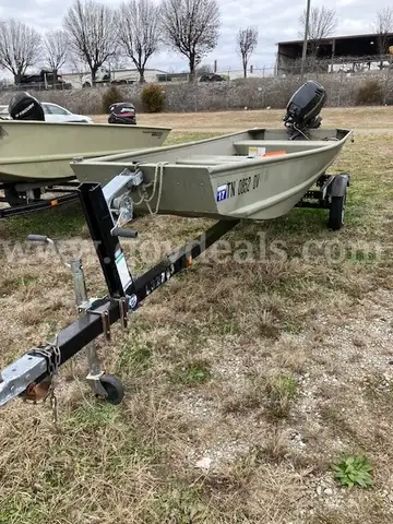 TRACKER TOPPER 14 JON BOAT W/MOTOR AND TRAILER