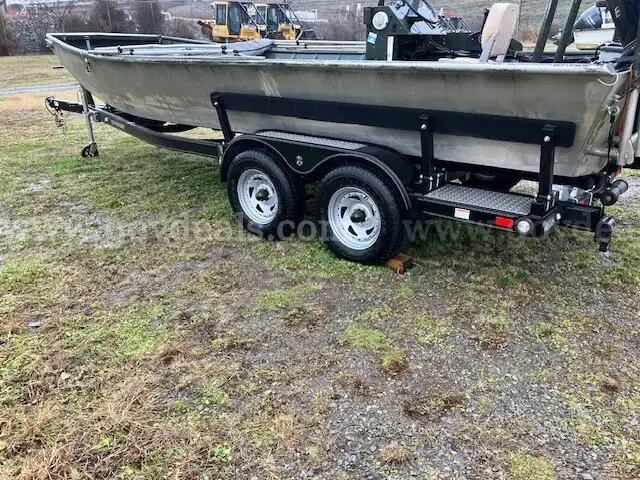 1990 SCHAFER 19MV JON BOAT W/ MOTOR AND TRAILER