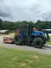 2021 New Holland Woods Boss TS6.120 with Brown cutter