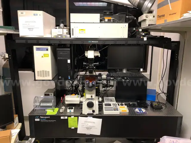 MICROSCOPE: INVERTED CONFOCAL FLUORECENCE, MOTORIZED W OPTICAL SUSPENSION TABLE 42&#x22;X 72&#x22;X12&#x22;