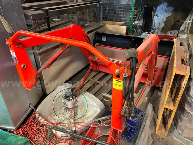 Kubota 54-inch front loader bucket attachment.