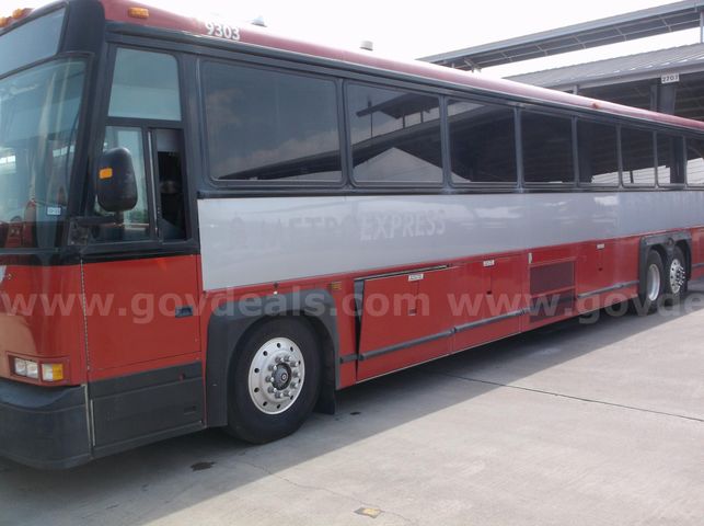 2003 MCI D4500 Motor Coach Transit Bus (Unit 9303) | AllSurplus