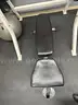Adjustable weight/fitness bench