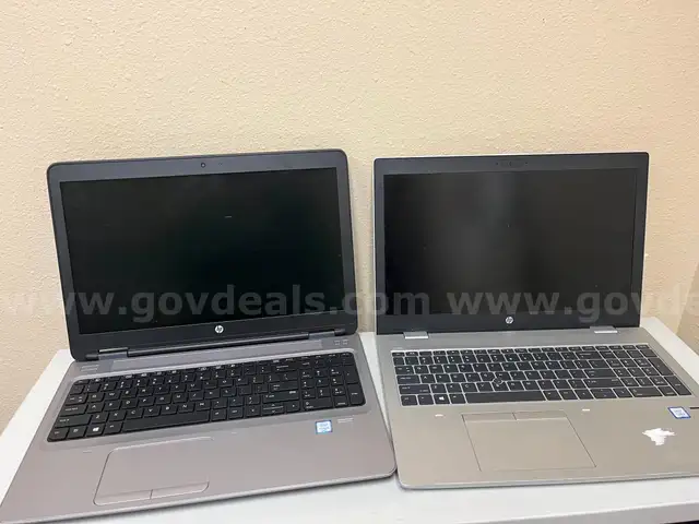 Lot of two laptops and one switch