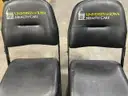 Lot of 2 Court Side Padded Folding Chairs from Carver Hawkeye Arena