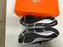 Lot of 14 pairs of Nike shoes, various styles and sizes