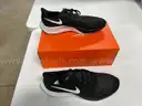 Lot of 14 pairs of Nike shoes, various styles and sizes
