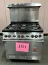 **** WOLF-STAINLESS STEEL 6-BURNER RANGE WITH CONVECTION OVEN AND BACK SPLASH **** (I)