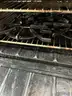 **** WOLF-STAINLESS STEEL 6-BURNER RANGE WITH CONVECTION OVEN AND BACK SPLASH **** (I)