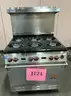 **** WOLF-STAINLESS STEEL 6-BURNER RANGE WITH CONVECTION OVEN AND BACK SPLASH **** (I)