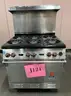 **** WOLF-STAINLESS STEEL 6-BURNER RANGE WITH CONVECTION OVEN AND BACK SPLASH **** (I)