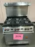 **** WOLF-STAINLESS STEEL 6-BURNER RANGE WITH CONVECTION OVEN AND BACK SPLASH **** (I)