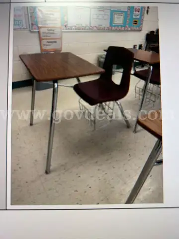 80 student desks with basket underneath