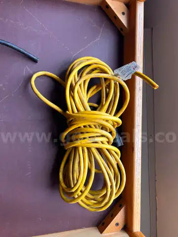 Extension Cord, 1 end bare. Approx. 30 feet. Did not unwrap for more precise length.