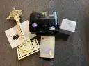 Projector for teaching in a small to medium-sized room, includes spare bulb.