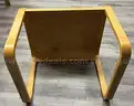 Blonde wood end table, loop legs