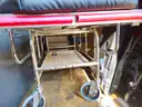 1 Medical Gurney with wheels.