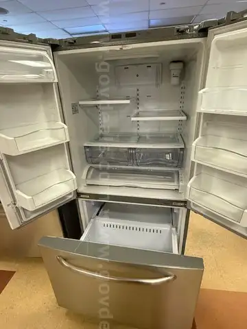 Lot #585; GE French Door Refrigerator