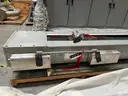 Swab Monitor System Vertical Rail Assembly and Canister Decon. Carria