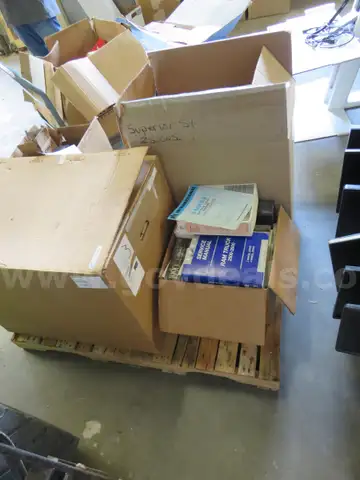 Boxes of Filters, Parts, &#x26; Manuals