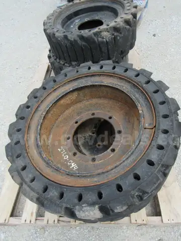 8-Skid Steer Tires w/Rims