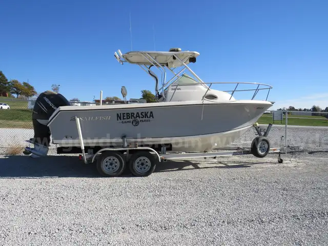 2010 Sailfish Boat w/ Trailer