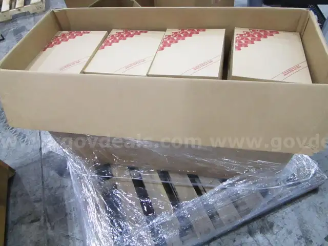 24 Boxes of Manila Folders (G)