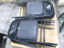 8 Black Folding Chairs (E)