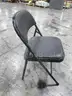 8 Black Folding Chairs (E)