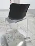 4 Black Stackable Chairs (A)