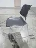 4 Black Stackable Chairs (A)