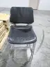 4 Black Stackable Chairs (A)
