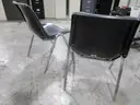 2 Black Stacking Chairs (C)