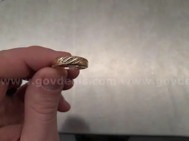 Gold Colored Ring with Diamond like Stones