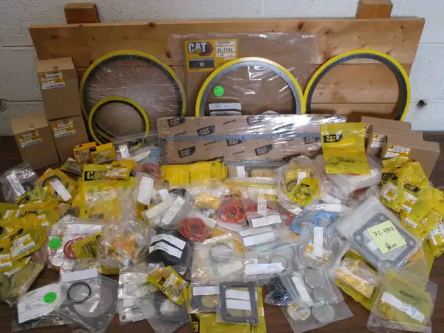 Lot of Service Manuals and various new service parts for Caterpillar 3412 engines