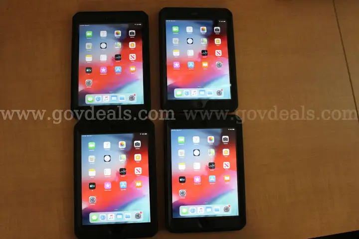 Four fully working iPad Mini 2's, each with 16GB storage, protective cases, no charging cables or AC adapters