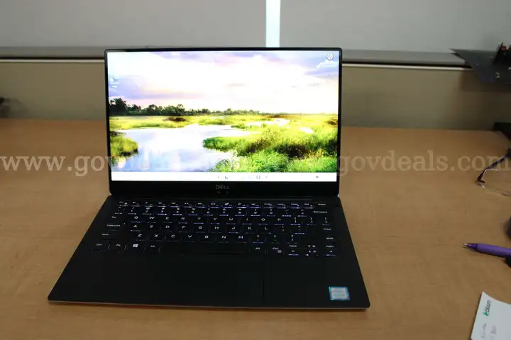 Dell XPS laptop with right corner separating, 8 GB RAM, 256GB SSD, wireless, bluetooth, OEM AC Adapter