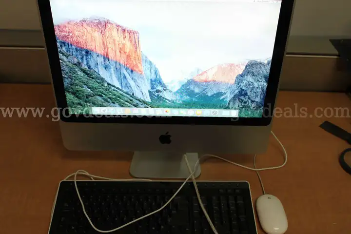 Fully working iMac with 2GB RAM, 2.4GHz Core 2 Duo Processor, OEM Apple Mouse, Keyboard, OEM Power Cord