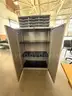 Set of one metal storage cabinet with a letter organizer tray