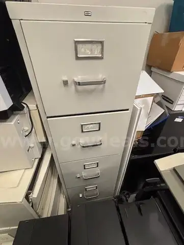 Three (3) metal cabinets of assorted color