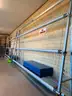Wall Racks to hold Rolls of Wrestling Mats