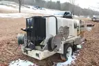 HYDRO TEK PRESSURE WASHER ON TRAILER