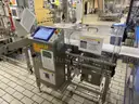 Carle Montanari Chocolate Moulding Line for Small Eggs and Balls, Foil Wrappers, Weigh Counters and Baggers