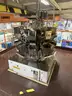 Carle Montanari Chocolate Moulding Line for Small Eggs and Balls, Foil Wrappers, Weigh Counters and Baggers