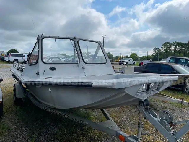 Aluminum Boat with Mercury Outboard and EZ Loader Trailer